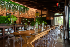 A large wooden table in Kraal Restaurant
