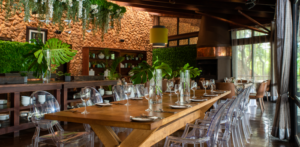 A large wooden table in Kraal Restaurant